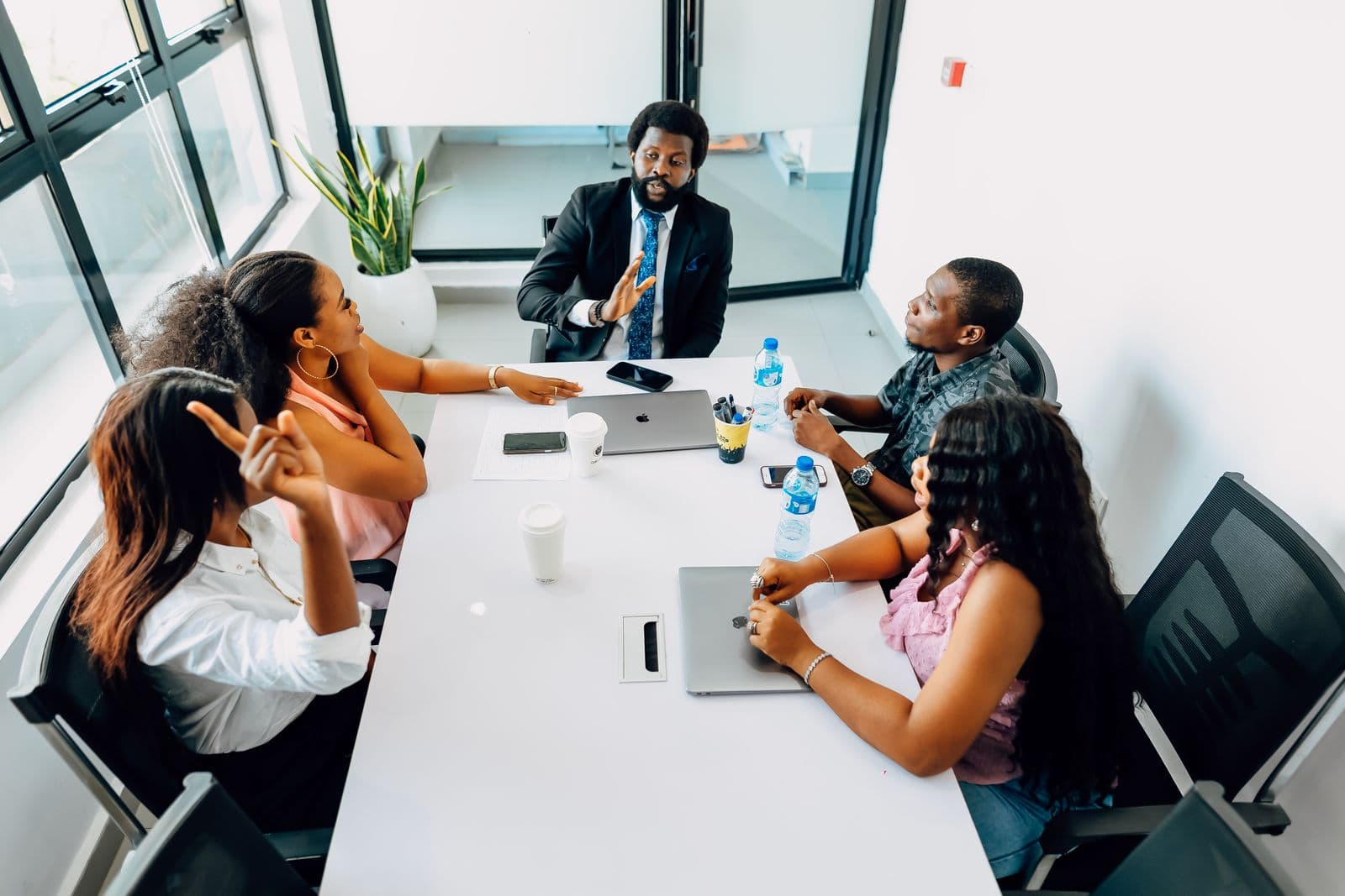 A strategist mapping an AI roadmap with a leadership team